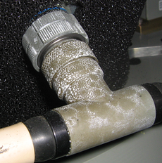 Cad bloom showing on tube joints. Cadmium bloom